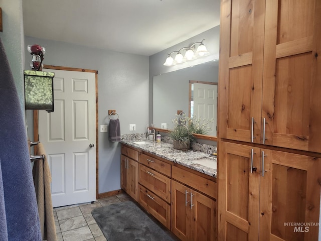131 Beaver Nob Dr, Kamiah, ID 83536 - bathroom featuring double vanity and tile patterned flooring