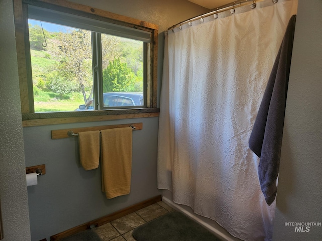 131 Beaver Nob Dr, Kamiah, ID 83536 - bathroom featuring tile patterned flooring and baseboards