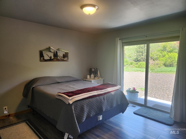 131 Beaver Nob Dr, Kamiah, ID 83536 - bedroom featuring wood finished floors and access to outside
