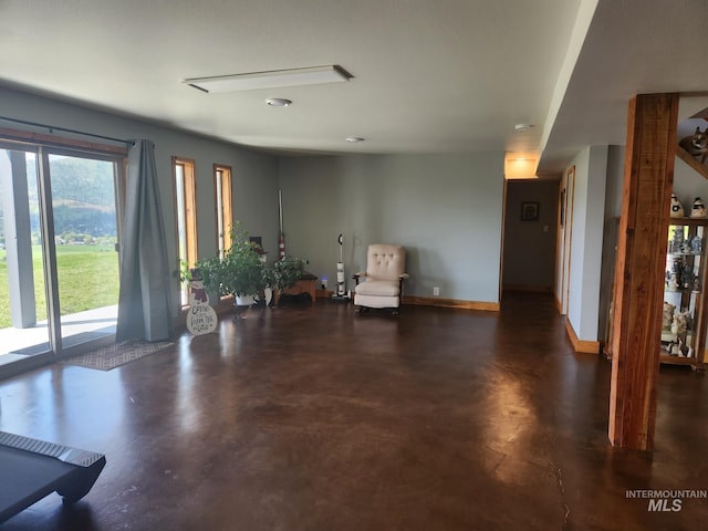 131 Beaver Nob Dr, Kamiah, ID 83536 - sitting room featuring concrete floors and baseboards