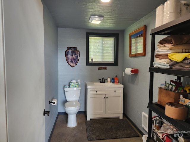 131 Beaver Nob Dr, Kamiah, ID 83536 - half bath featuring toilet, vanity, and baseboards