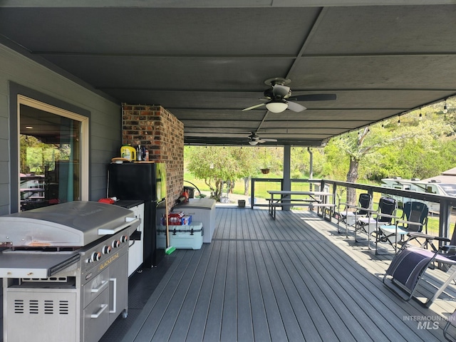 131 Beaver Nob Dr, Kamiah, ID 83536 - wooden deck with a ceiling fan and area for grilling