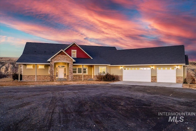 craftsman inspired home featuring a garage