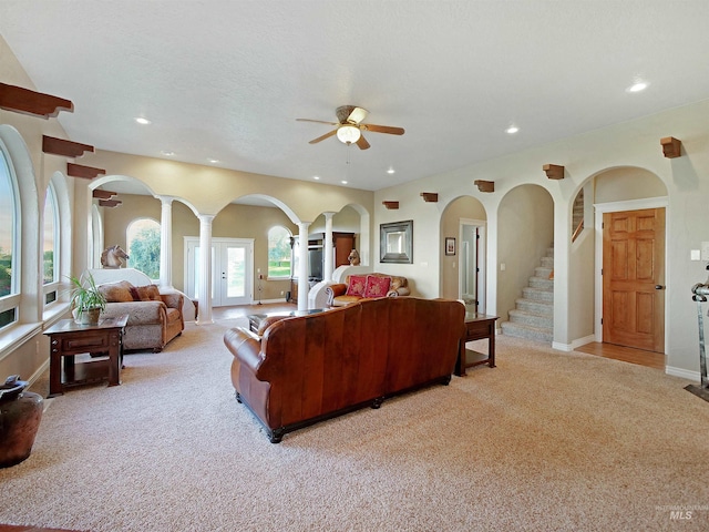 16480 Goodson Rd, Caldwell, ID 83607 - living room with a textured ceiling, carpet floors, and ceiling fan