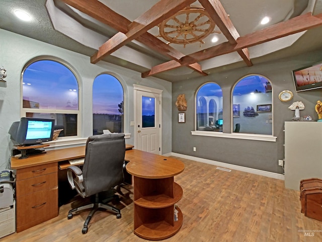 16480 Goodson Rd, Caldwell, ID 83607 - office area with beamed ceiling, light hardwood / wood-style flooring, and built in desk