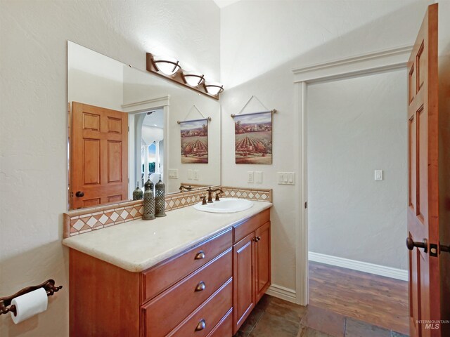 16480 Goodson Rd, Caldwell, ID 83607 - bathroom with hardwood / wood-style flooring and oversized vanity
