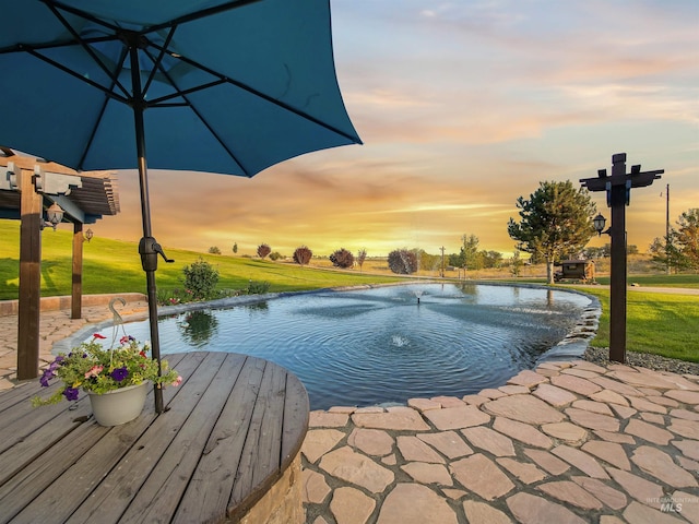 16480 Goodson Rd, Caldwell, ID 83607 - pool at dusk with a yard