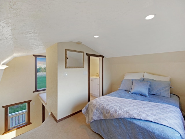 16480 Goodson Rd, Caldwell, ID 83607 - bedroom featuring ensuite bath, lofted ceiling, carpet floors, and a textured ceiling