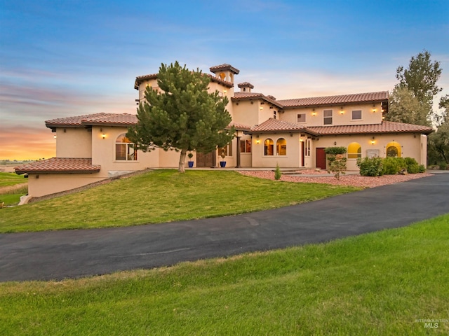 16480 Goodson Rd, Caldwell, ID 83607 - mediterranean / spanish-style house with a lawn