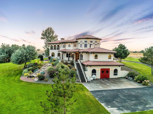 16480 Goodson Rd, Caldwell, ID 83607 - mediterranean / spanish house featuring a yard