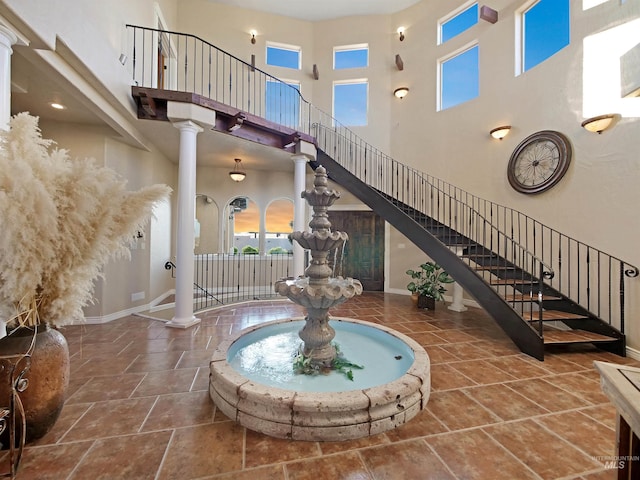 16480 Goodson Rd, Caldwell, ID 83607 - interior space featuring tile flooring, ornate columns, and a high ceiling