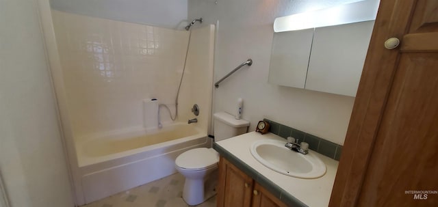 bathroom featuring vanity, bathing tub / shower combination, and toilet