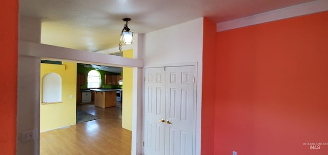 hall with light wood-style floors