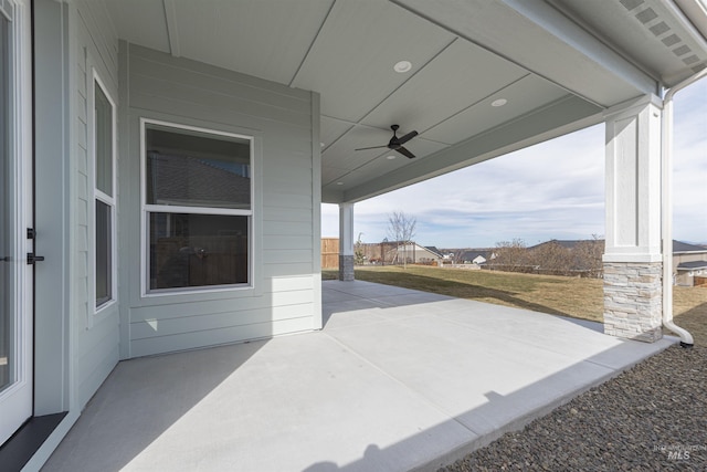 view of patio featuring ceiling fan