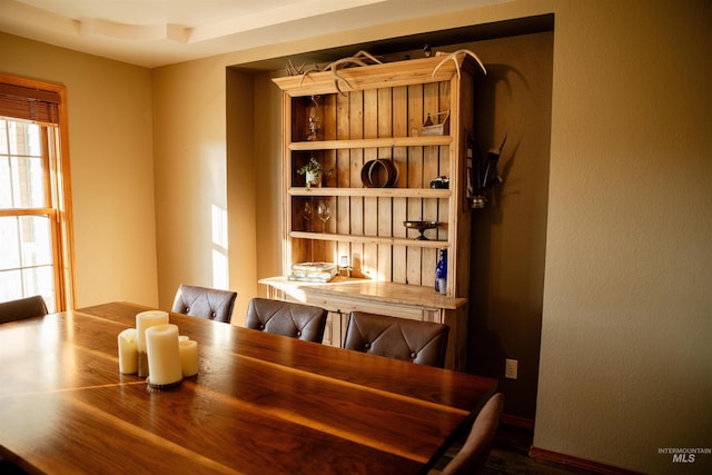 dining area with hardwood / wood-style floors