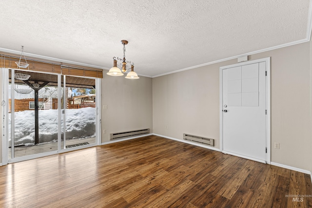 unfurnished dining area with ornamental molding, baseboard heating, wood finished floors, and a notable chandelier