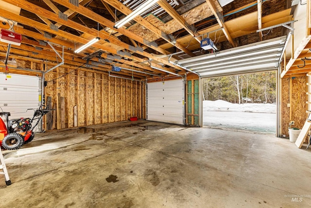 garage featuring a garage door opener