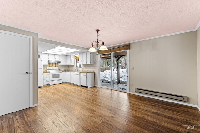 kitchen featuring wood-type flooring, a baseboard heating unit, a sink, white appliances, and under cabinet range hood