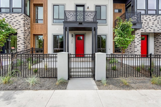 doorway to property featuring a balcony