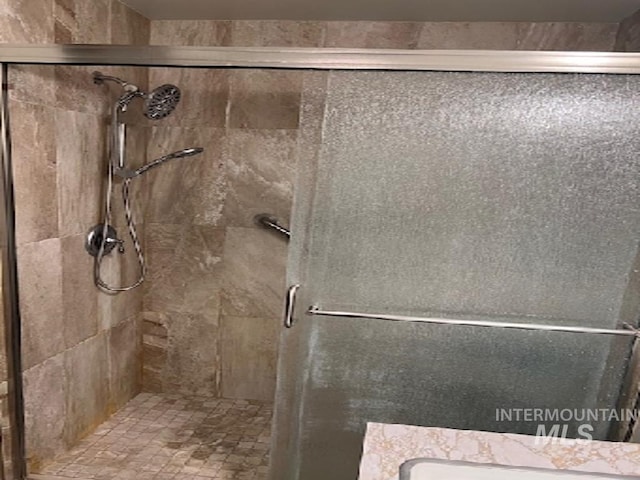 full bathroom with a stall shower