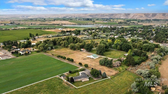 aerial view with a mountain view and a rural view