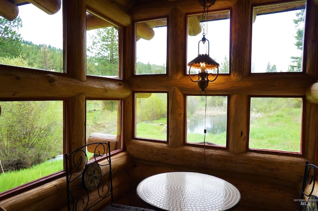 sunroom / solarium with plenty of natural light