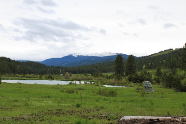 property view of mountains featuring a water view