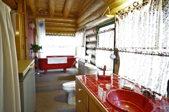 bathroom featuring beamed ceiling, log walls, vanity with extensive cabinet space, toilet, and wooden ceiling