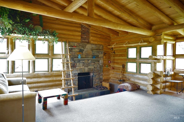 living room featuring beamed ceiling, wooden ceiling, a stone fireplace, and rustic walls