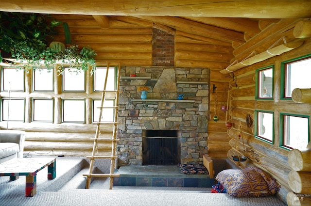 living room featuring lofted ceiling with beams, log walls, and a fireplace