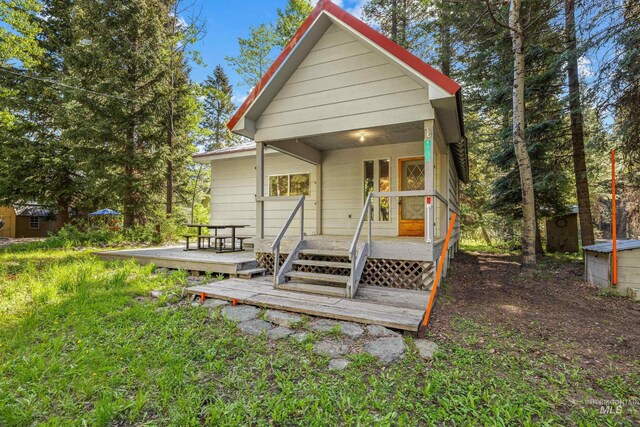 1718 Warren Wagon Rd, Mccall, ID 83638 - view of front of home with a wooden deck