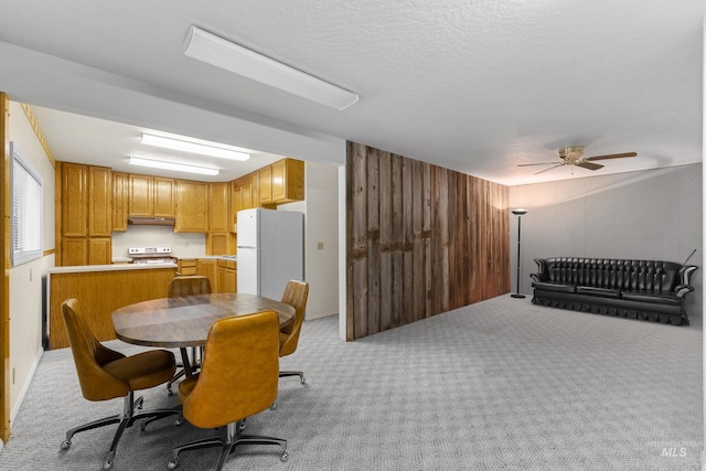 1718 Warren Wagon Rd, Mccall, ID 83638 - dining space with light colored carpet and ceiling fan