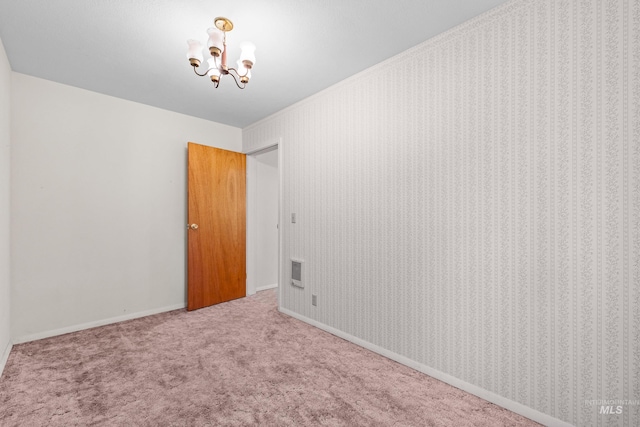 1718 Warren Wagon Rd, Mccall, ID 83638 - carpeted spare room with a chandelier and baseboards