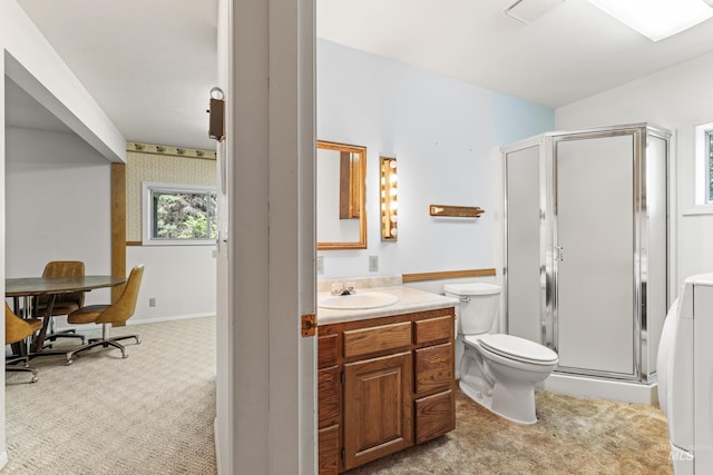 1718 Warren Wagon Rd, Mccall, ID 83638 - full bath with vanity, a stall shower, toilet, and washer / clothes dryer