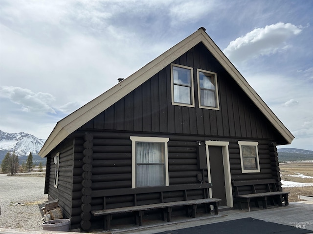 1150 Eva Falls Ave, Stanley, ID 83278 - view of home's exterior featuring log siding and a mountain view