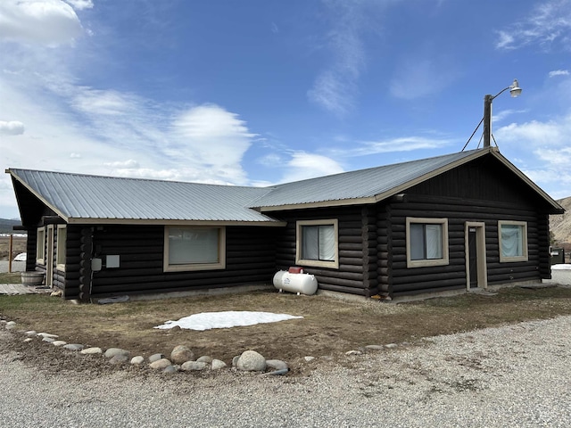 1150 Eva Falls Ave, Stanley, ID 83278 - view of side of property with log exterior and metal roof