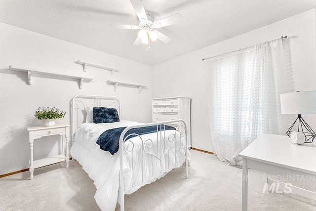 11151 W Hinsdale St, Boise, ID 83713 - bedroom featuring light colored carpet, ceiling fan, and baseboards
