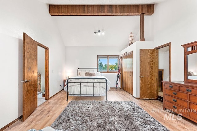 11151 W Hinsdale St, Boise, ID 83713 - bedroom featuring high vaulted ceiling, light wood-style floors, and beamed ceiling