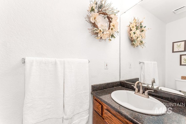 11151 W Hinsdale St, Boise, ID 83713 - half bathroom featuring vanity and toilet