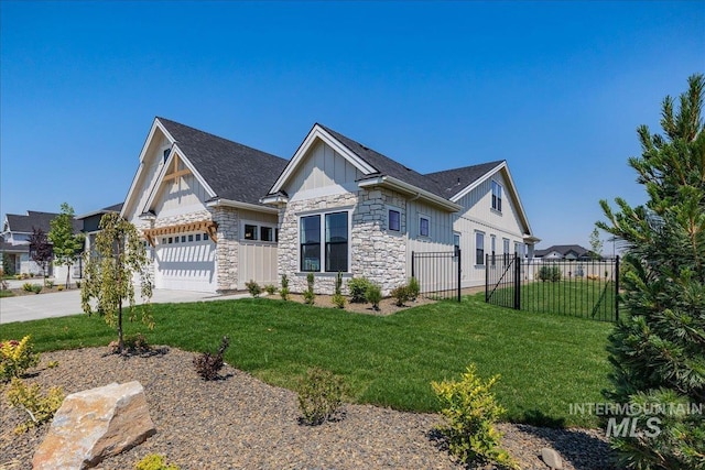 view of front facade with a garage and a front lawn