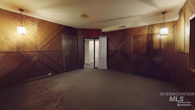 basement with wood walls