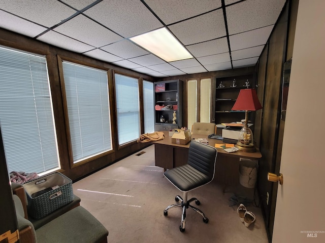 office with a paneled ceiling