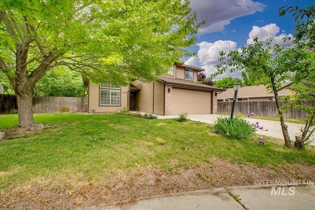 view of property hidden behind natural elements featuring driveway, a garage, and brick siding