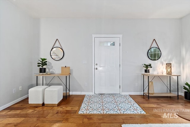 foyer with hardwood / wood-style floors