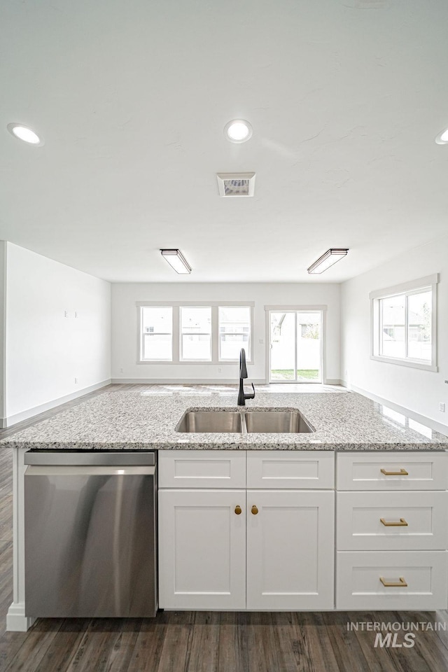 665 Emma Ct, Idaho Falls, ID 83404 - kitchen with dishwasher, a sink, white cabinetry, light stone counters, and recessed lighting