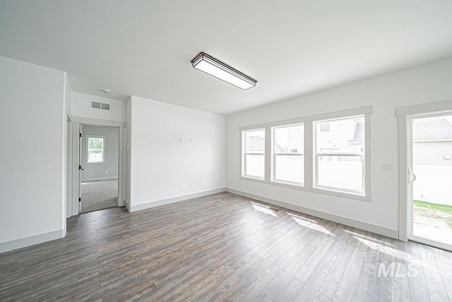 665 Emma Ct, Idaho Falls, ID 83404 - unfurnished room featuring wood finished floors and baseboards