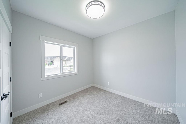 665 Emma Ct, Idaho Falls, ID 83404 - unfurnished room featuring carpet floors and baseboards