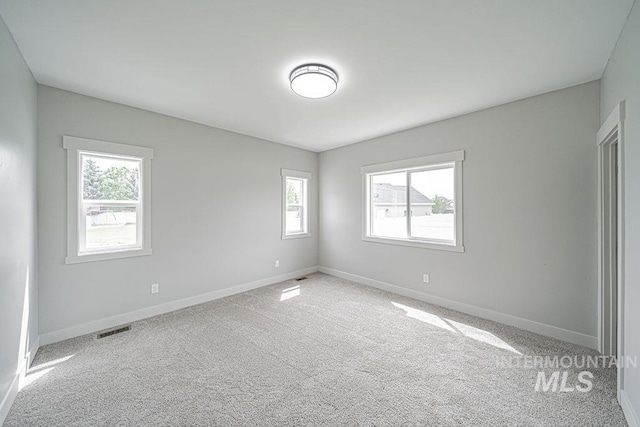 665 Emma Ct, Idaho Falls, ID 83404 - carpeted empty room with baseboards