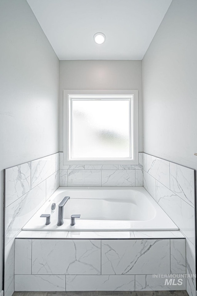 665 Emma Ct, Idaho Falls, ID 83404 - full bathroom with a garden tub