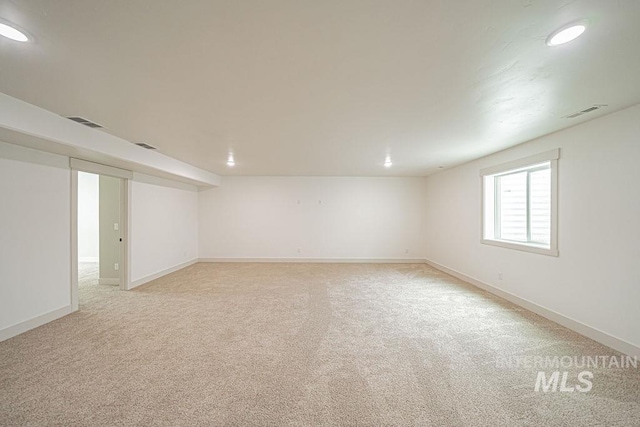 665 Emma Ct, Idaho Falls, ID 83404 - below grade area featuring baseboards, light colored carpet, and recessed lighting